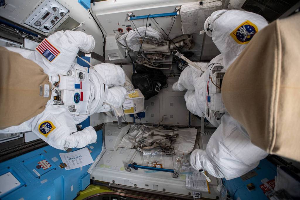 A pair of U.S. spacesuits in the Quest airlock