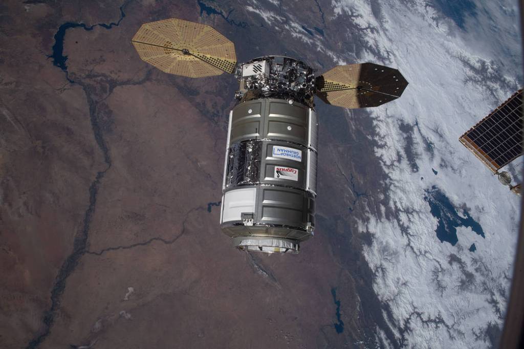 The Cygnus space freighter approaches the space station