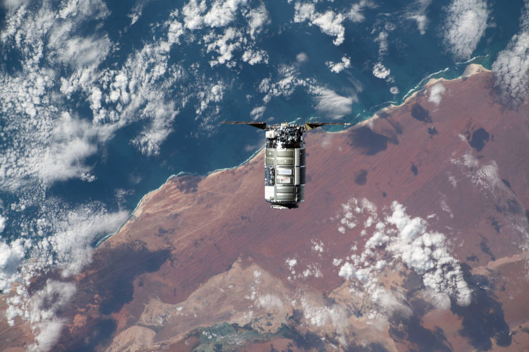 The Cygnus space freighter approaches the space station