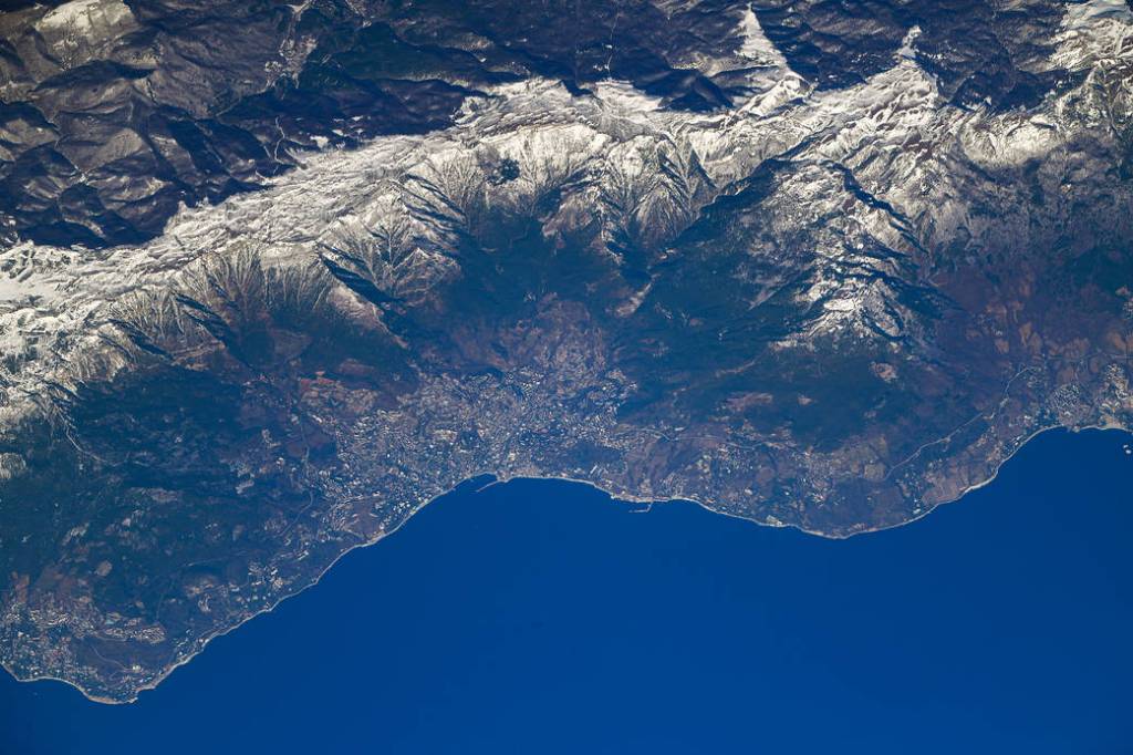 The snow-capped Crimean Mountains and the city of Yalta