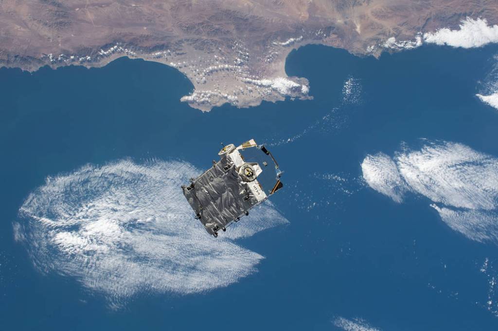 An external pallet is released from the Canadarm2 robotic arm