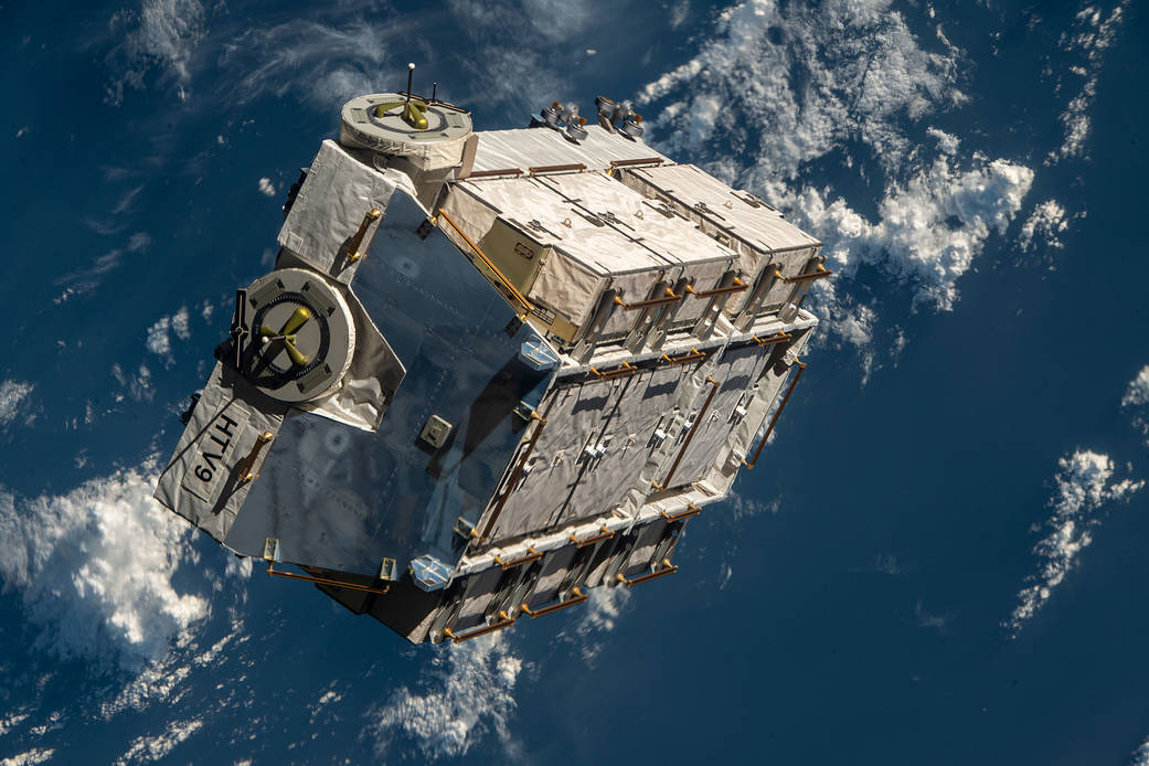 An external pallet is released from the Canadarm2 robotic arm