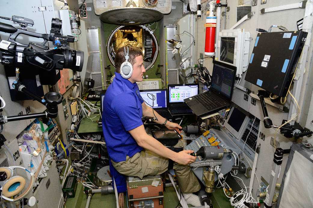 Cosmonaut Sergey Kud-Sverchkov works inside the Zvezda service module