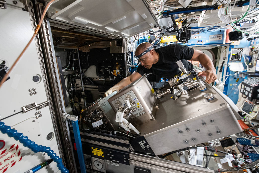 Astronaut Victor Glover replaces Fluids Integrated Rack hardware