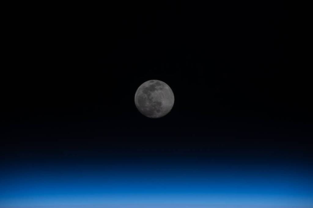 Full Moon above the Earth’s horizon