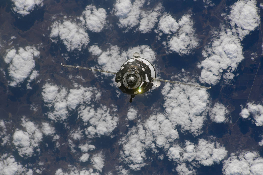 The Soyuz MS-18 crew ship approaches the space station
