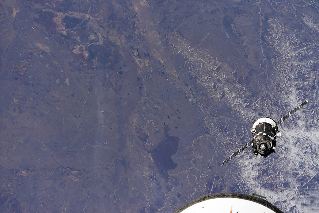 The Soyuz MS-18 crew ship approaches the space station