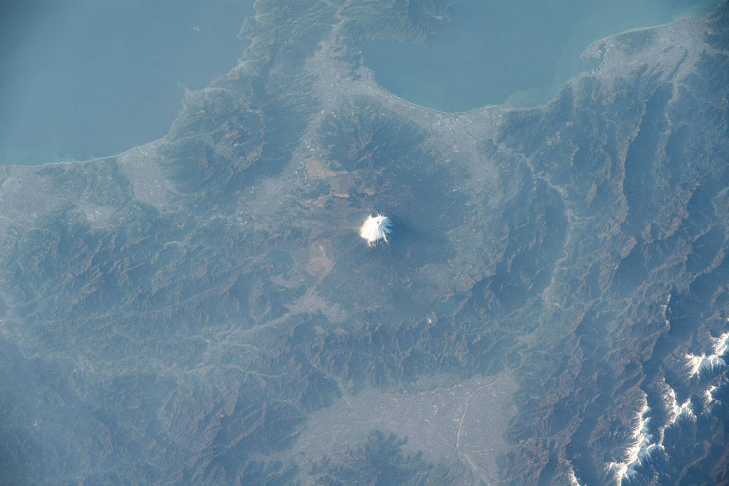 Mount Fuji, north of Suruga Bay and west of Tokyo