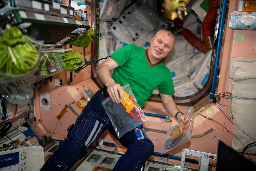 Roscosmos cosmonaut Oleg Novitskiy works electrical maintenance