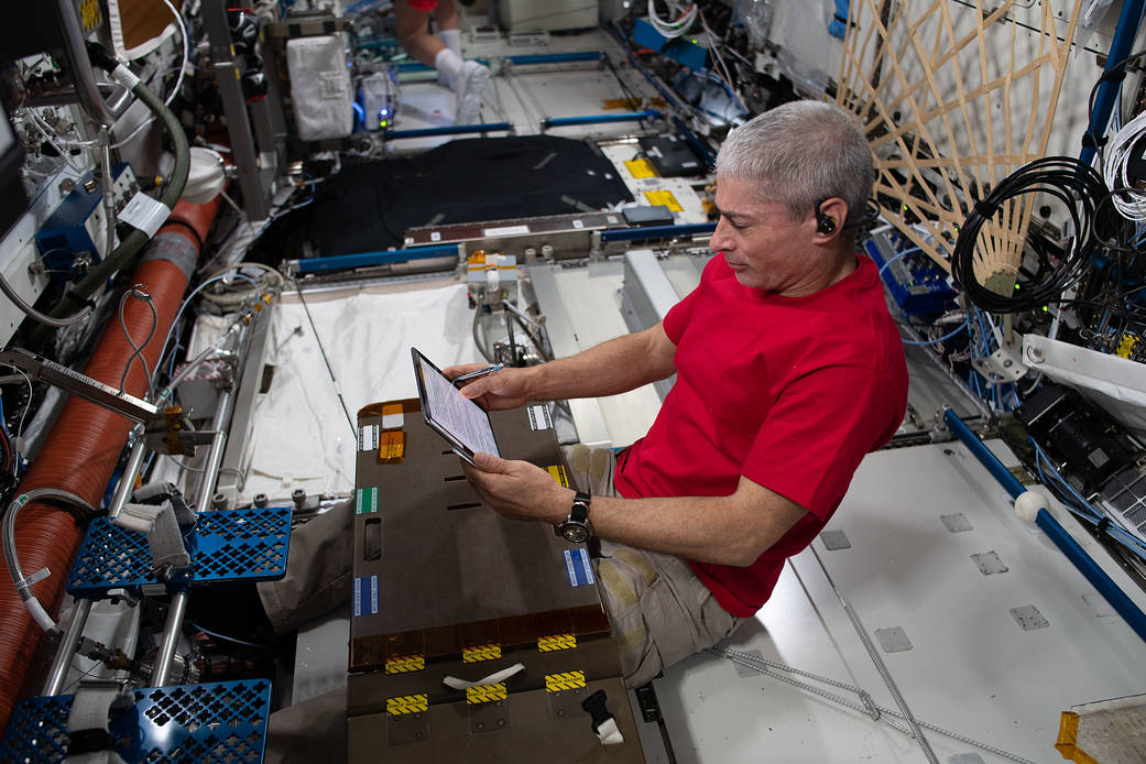 NASA astronaut Mark Vande Hei checks out emergency hardware