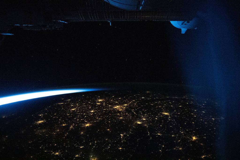 An orbital twilight fades over the city lights of Europe