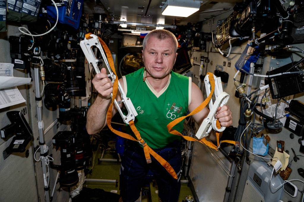 Cosmonaut Oleg Novitskiy shows off Russian spacewalking gear