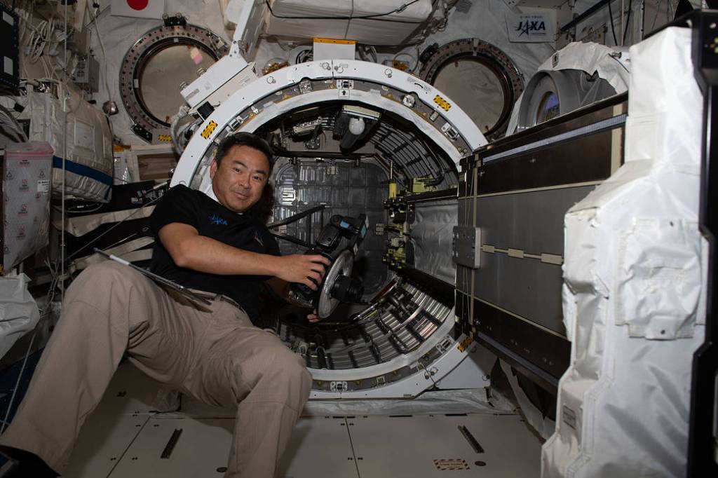 Expedition 65 Commander Akihiko Hoshide works inside Kibo