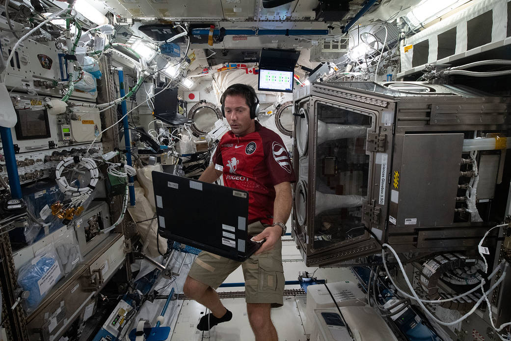 Astronaut Thomas Pesquet works inside the Kibo laboratory module