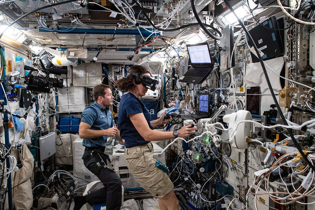 Astronauts Thomas Pesquet and Megan McArthur participate in the Pilote experiment