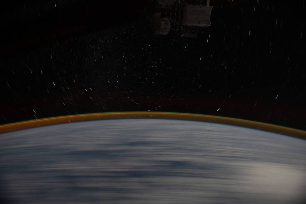 Earth’s Atmospheric Glow and Star Trails