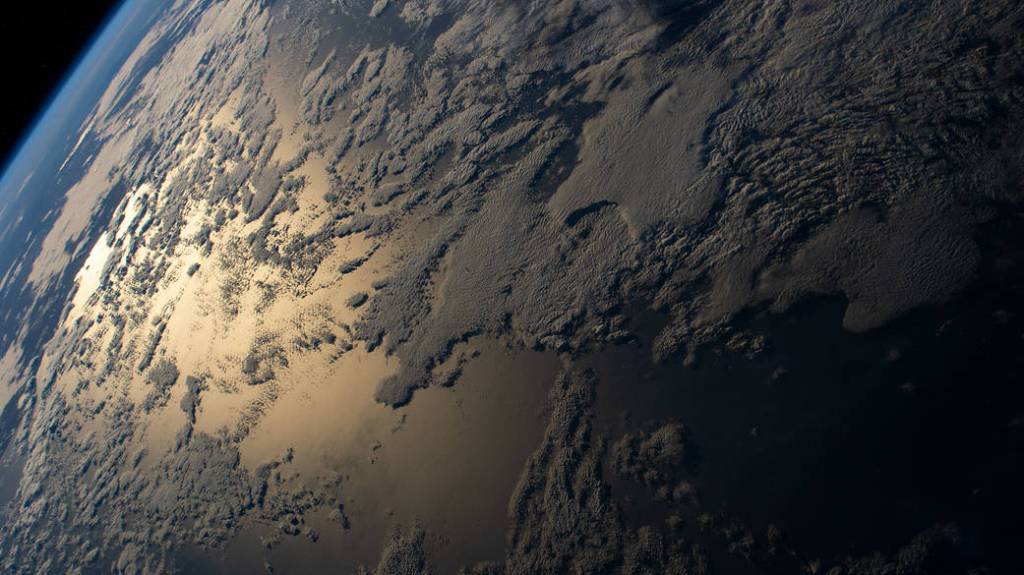 The sun’s glint beams off the Indian Ocean