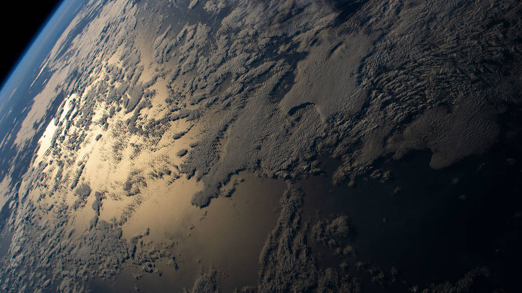 The sun's glint beams off the Indian Ocean