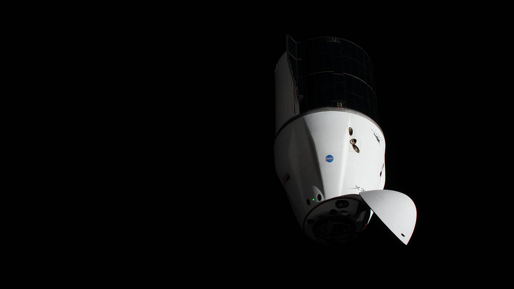 The SpaceX Cargo Dragon approaches the space station