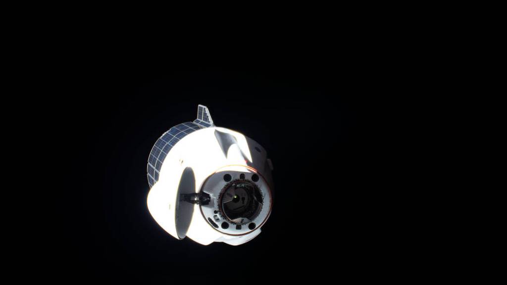 The SpaceX Cargo Dragon approaches the space station
