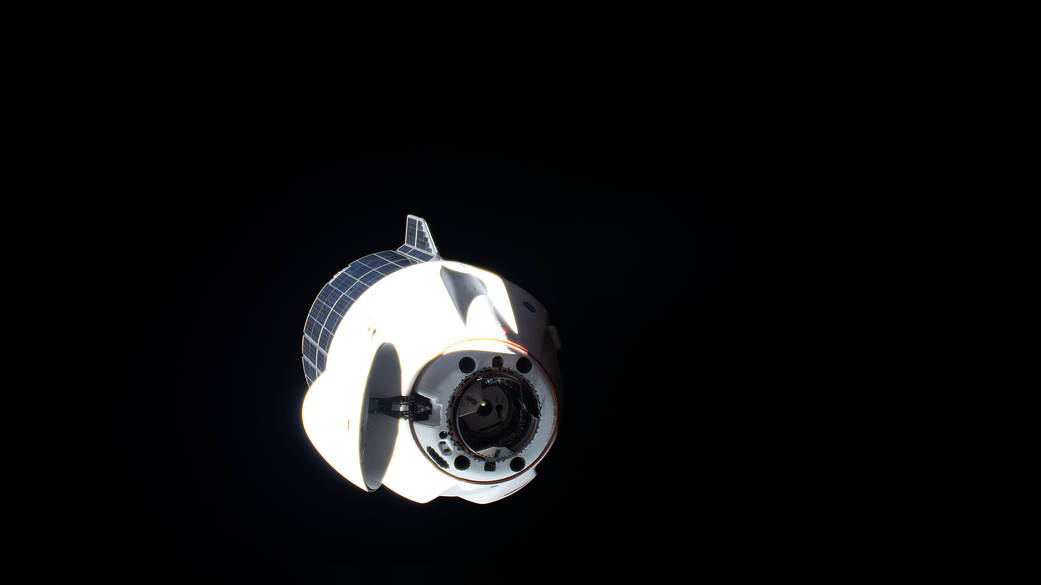 The SpaceX Cargo Dragon approaches the space station