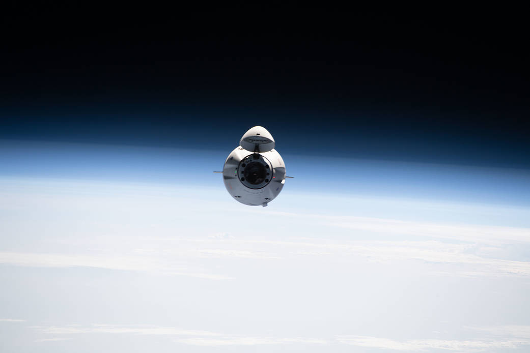 The SpaceX Cargo Dragon approaches the space station