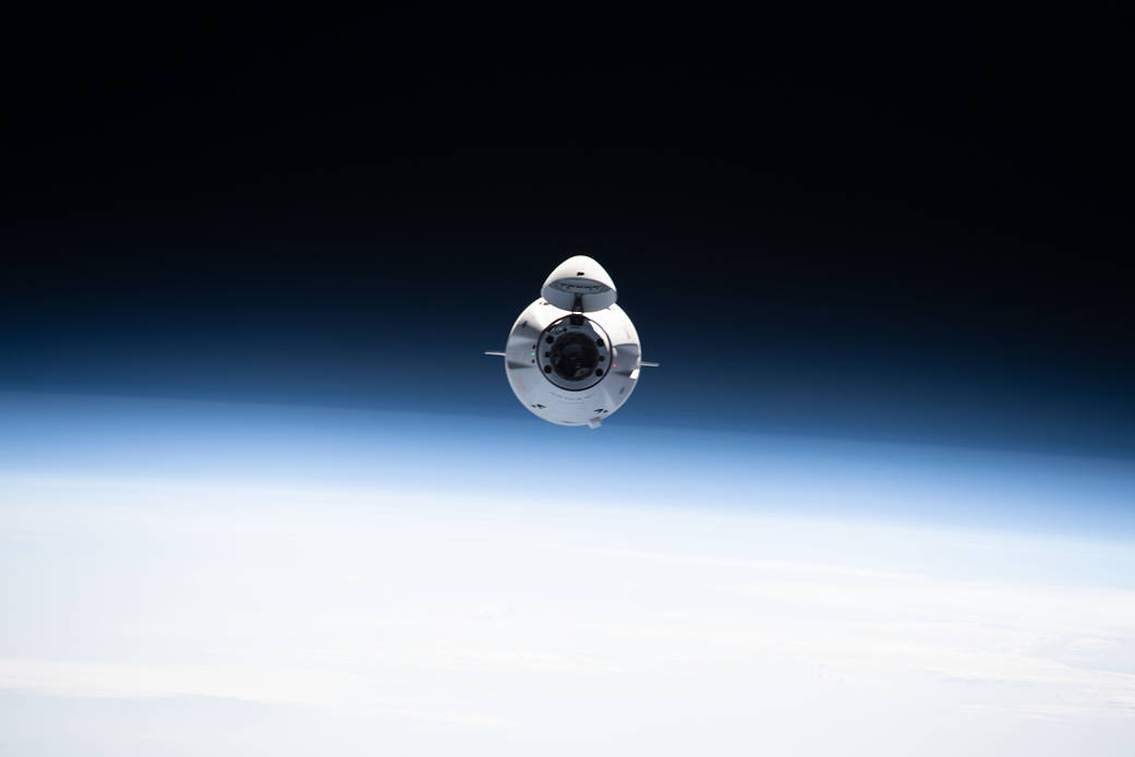 The SpaceX Cargo Dragon approaches the space station
