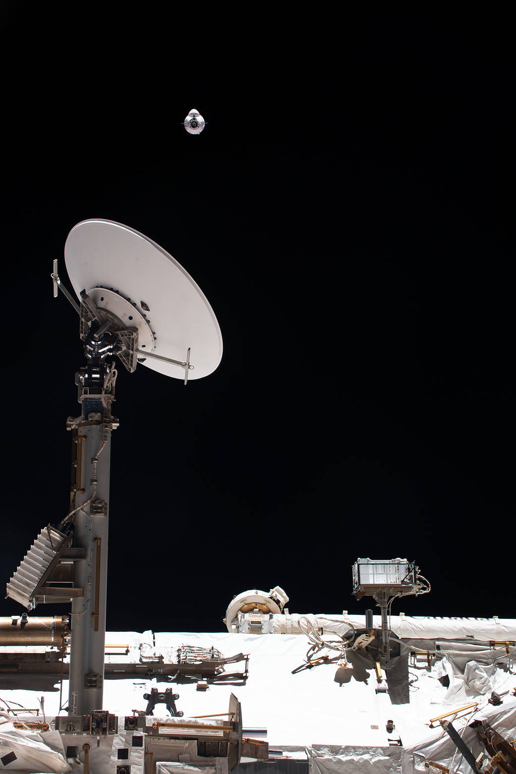 The SpaceX Cargo Dragon approaches the space station