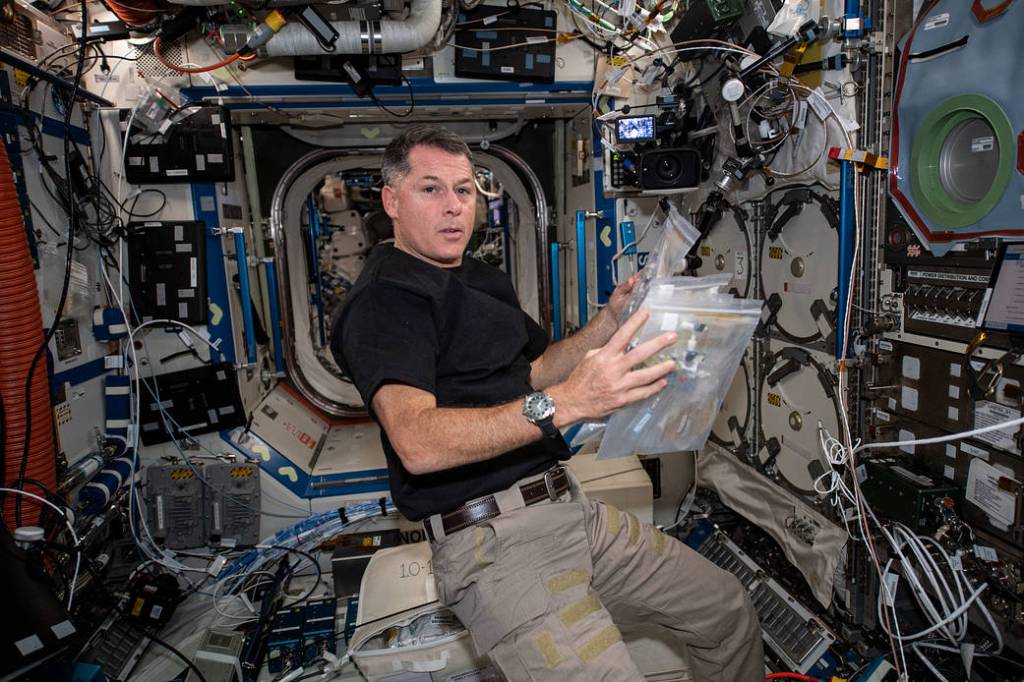 Astronaut Shane Kimbrough works on the Oral Biofilms in Space study