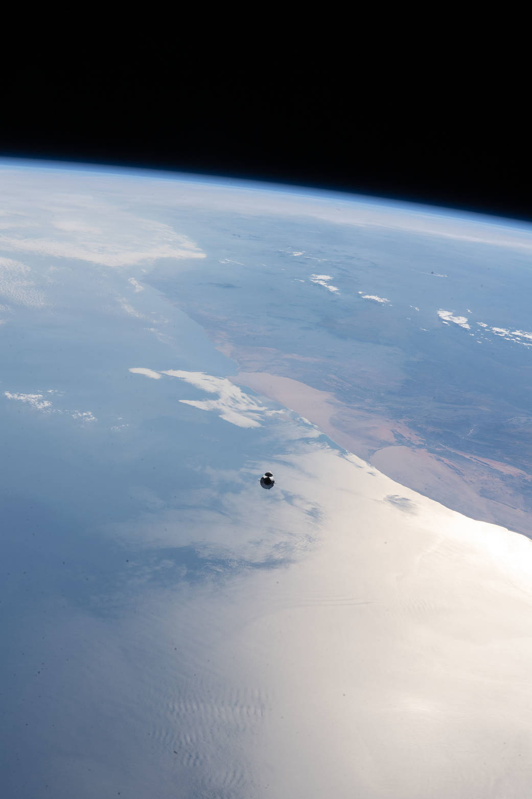 The SpaceX Cargo Dragon approaches the International Space Station