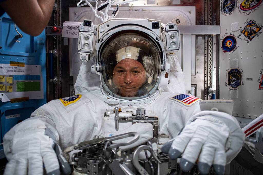 Astronaut Shane Kimbrough is suited up preparing for a spacewalk