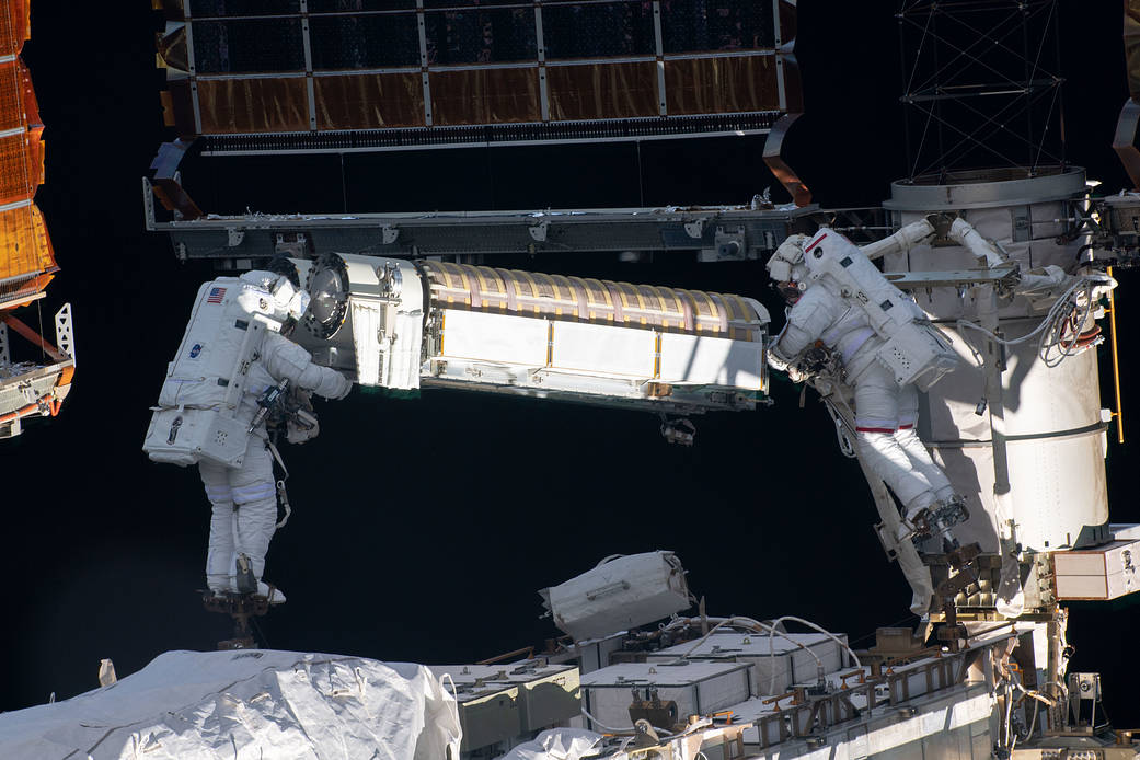 Spacewalkers Shane Kimbrough and Thomas Pesquet during solar array installation