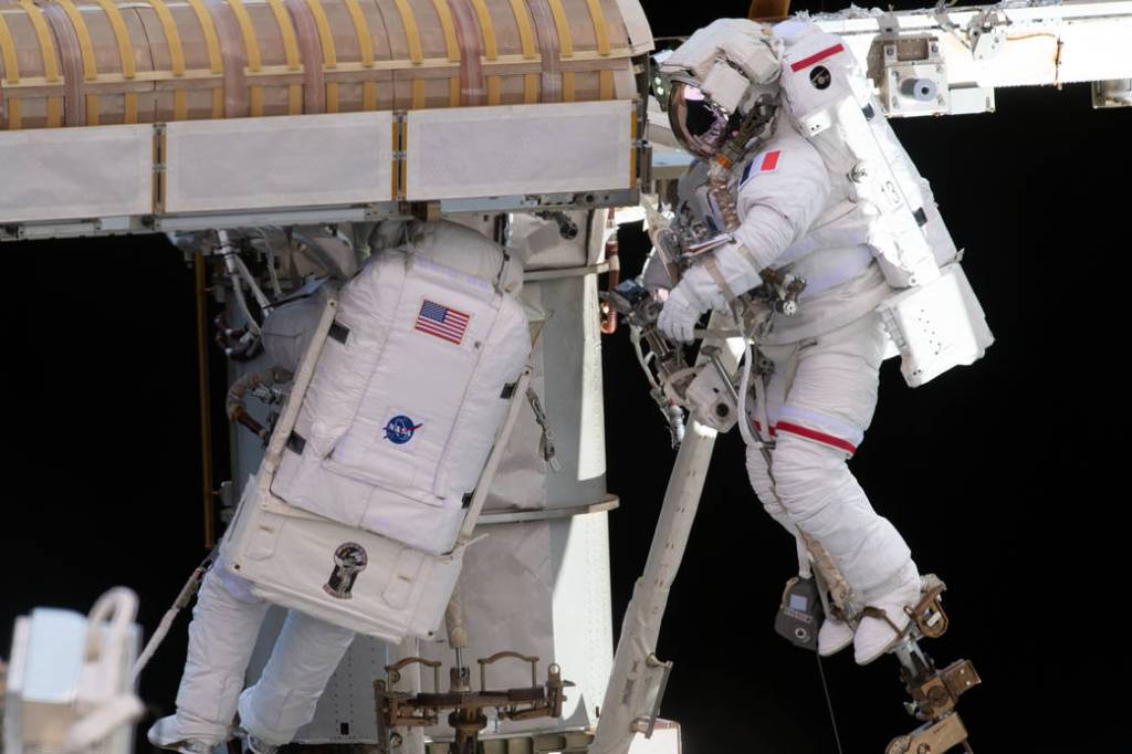Spacewalkers Shane Kimbrough and Thomas Pesquet during solar array installation