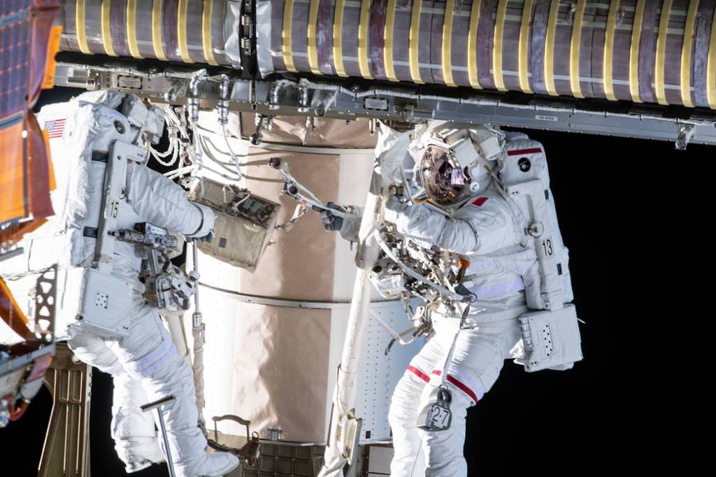 Spacewalkers Shane Kimbrough and Thomas Pesquet during solar array installation
