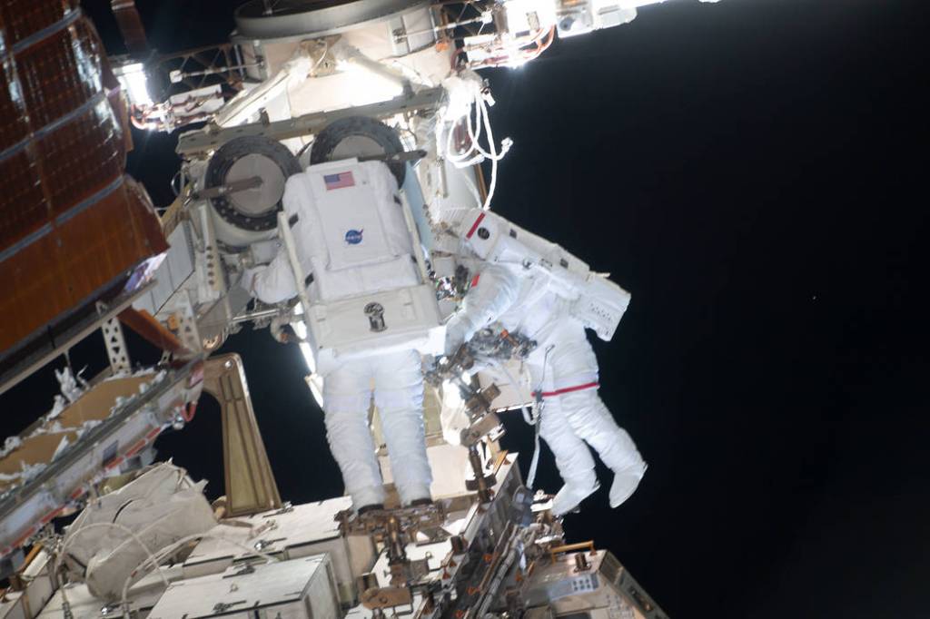 Spacewalkers Shane Kimbrough and Thomas Pesquet during solar array installation