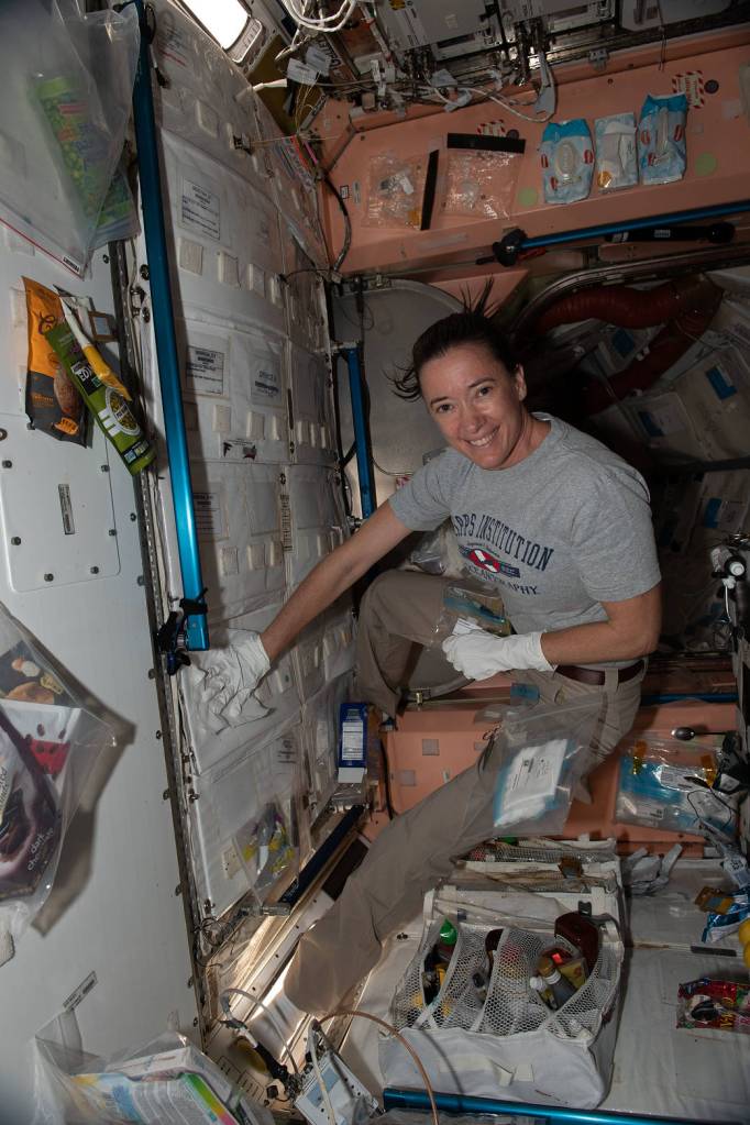 NASA astronaut Megan McArthur collects microbial samples