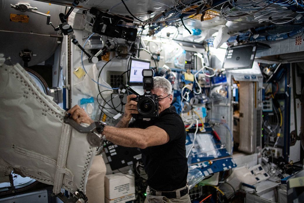 Astronaut Mark Vande during photographic activities