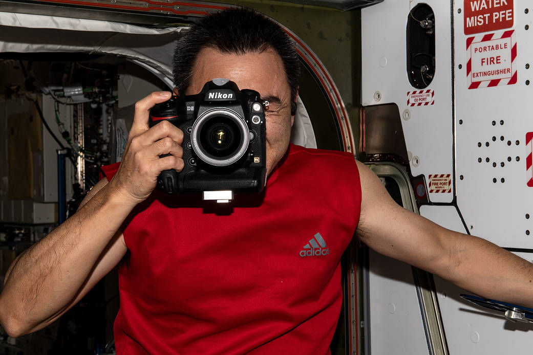Commander Akihiko Hoshide during photographic activities