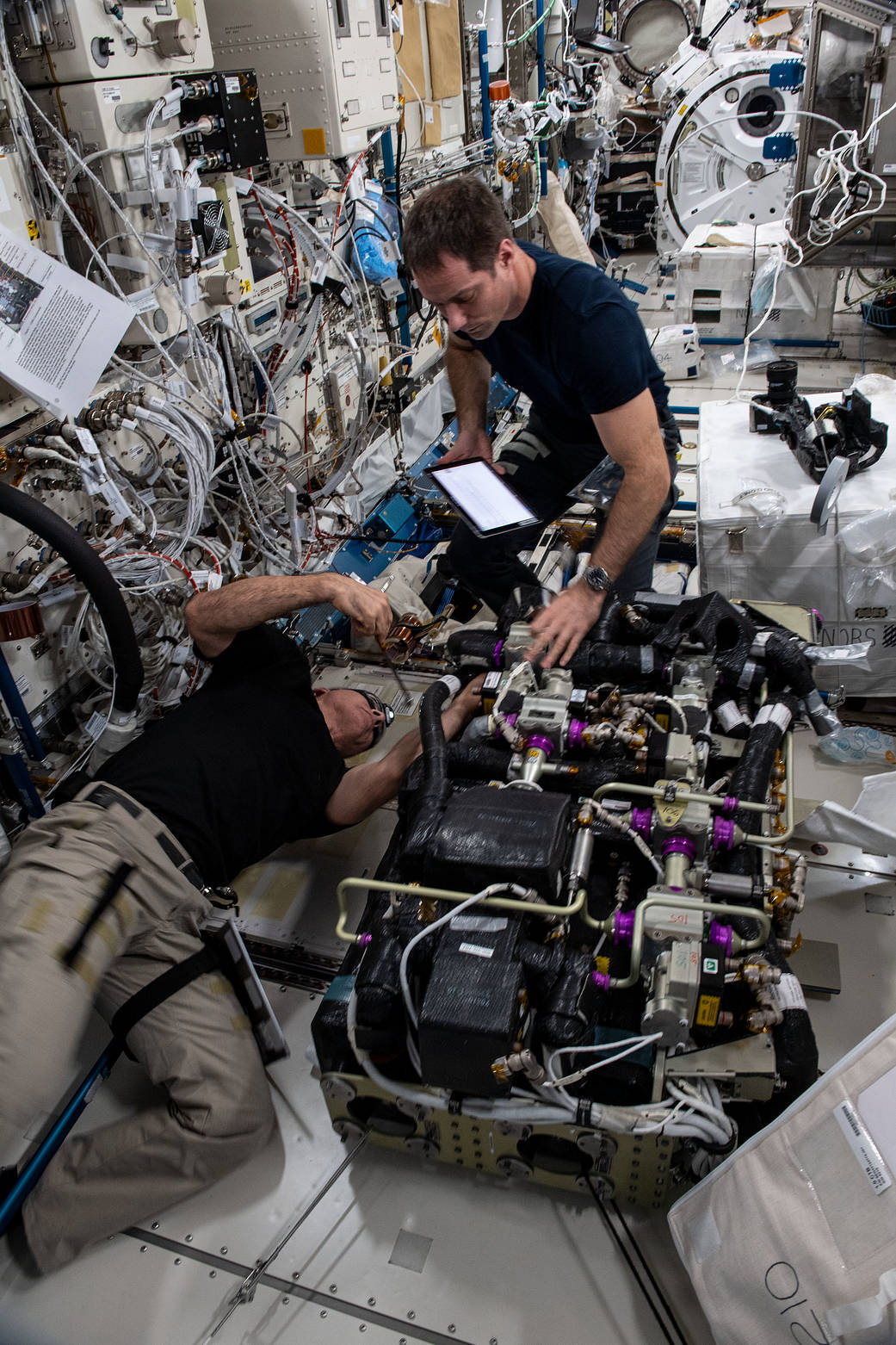 Astronauts Thomas Pesquet and Mark Vande Hei replace life support components