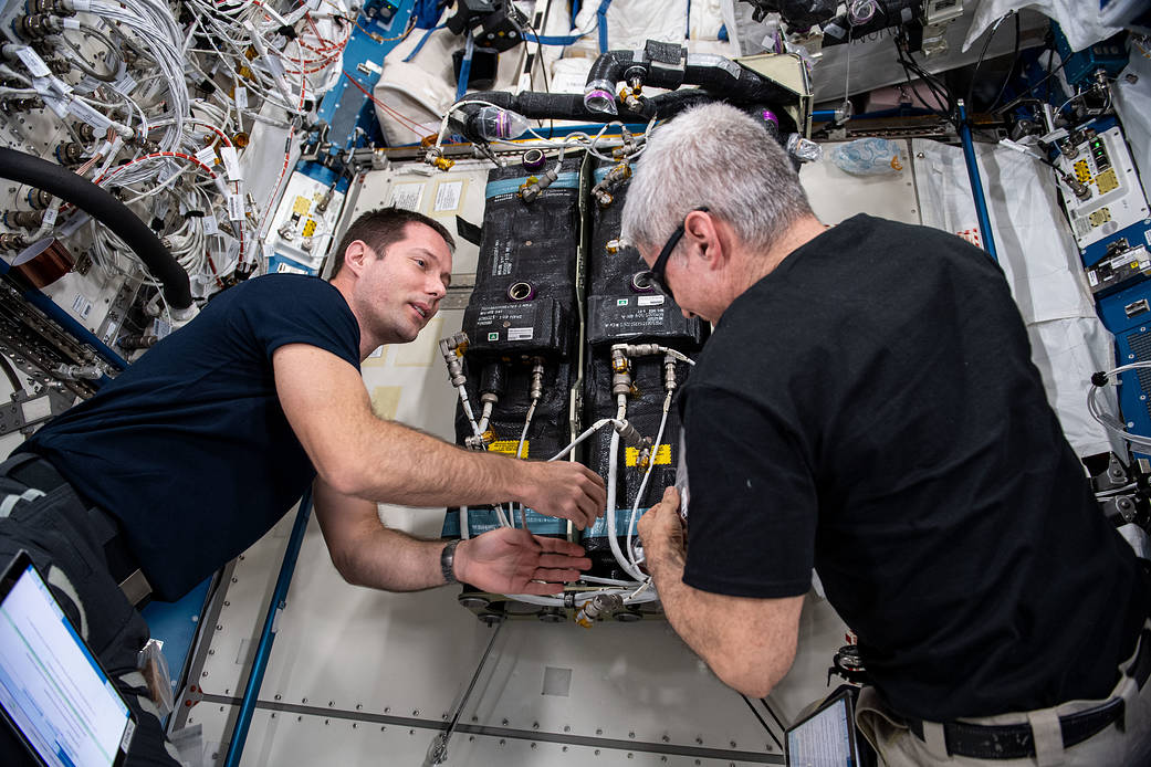 Astronauts Thomas Pesquet and Mark Vande Hei replace life support components