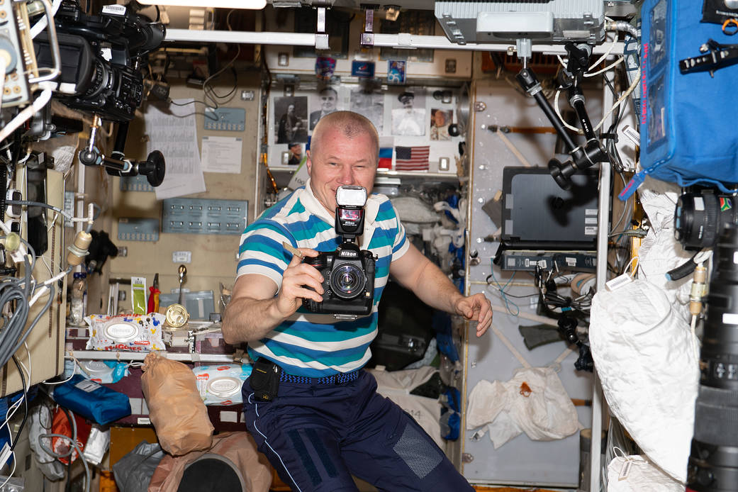 Cosmonaut Oleg Novitskiy during photography activities