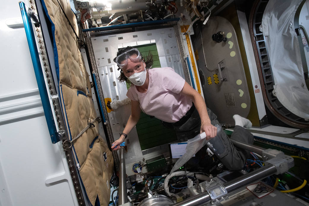Astronaut Megan McArthur works on orbital plumbing tasks
