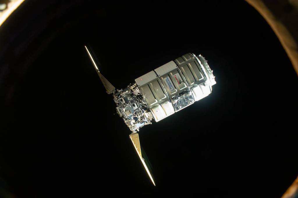 The Cygnus space freighter approaches the space station