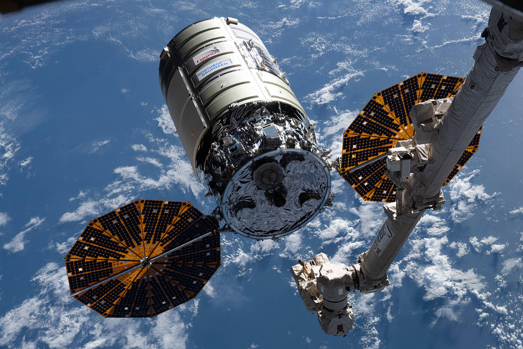 Cygnus awaits its capture above the Atlantic Ocean