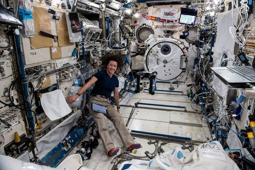 Astronaut Megan McArthur monitors an Astrobee robotic free-flyer
