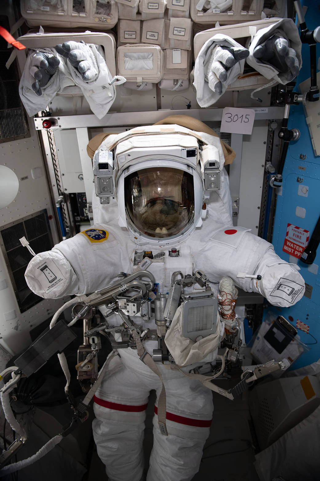 An empty U.S. spacesuit in the Quest airlock
