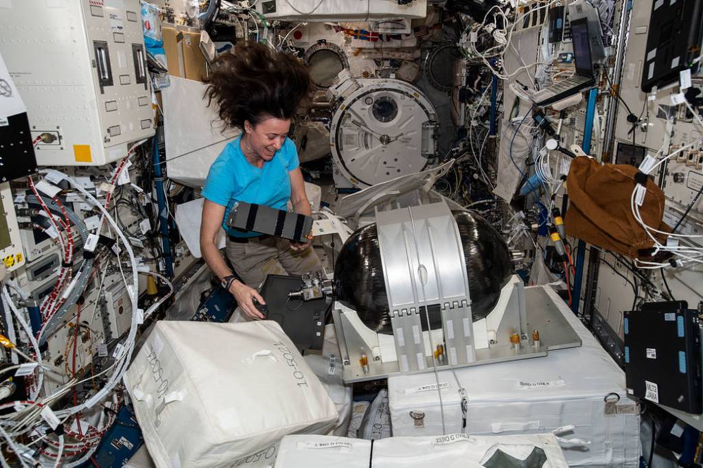 Astronaut Megan McArthur assembles an Emergency Air Supply tank