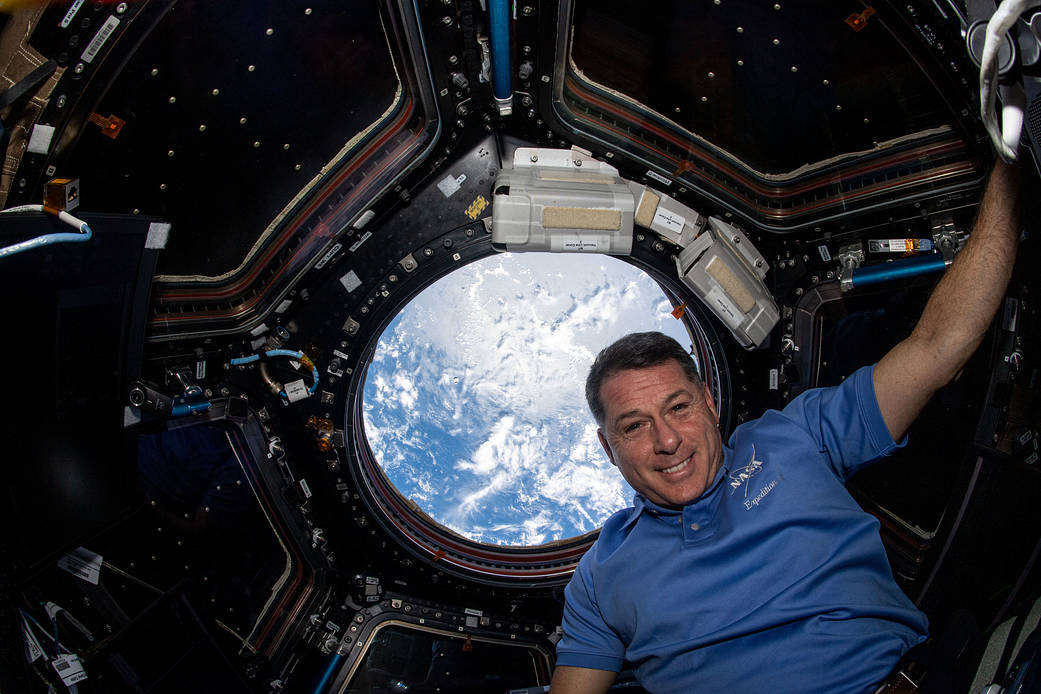 Astronaut Shane Kimbrough takes a midday break inside the cupola