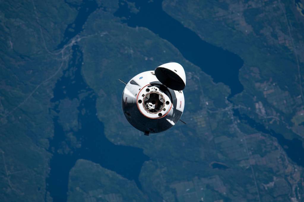 The SpaceX Cargo Dragon approaches the station
