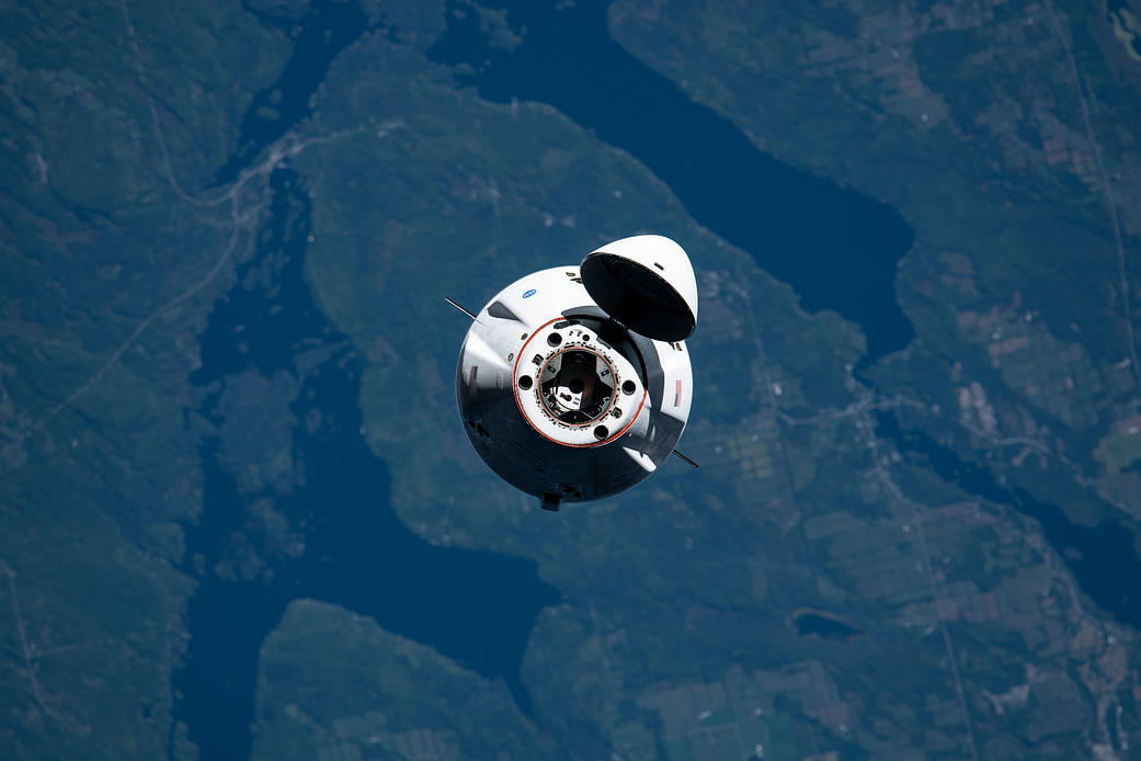 The SpaceX Cargo Dragon approaches the station